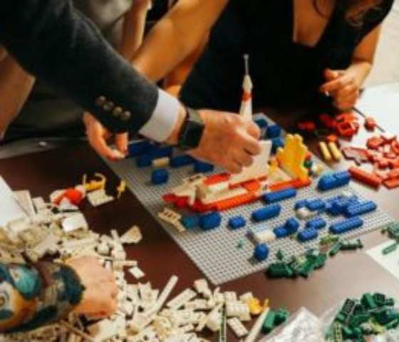 Team-building activities at WOW Bintan, showcasing corporate retreats and community engagement experiences.